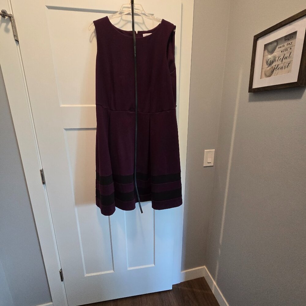 Beautiful plum color dress with black trim
